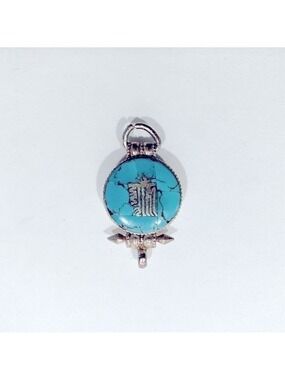 Stamped Silver Pendant With Turquoise Inlay.